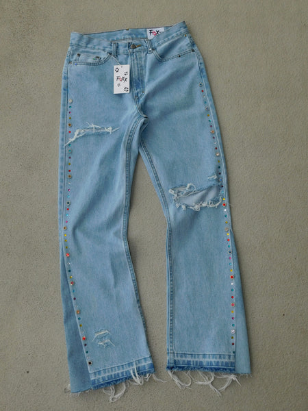 Distressed jewel flare denims