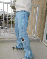 Distressed jewel flare denims