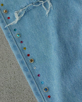 Distressed jewel flare denims