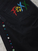 Black flared jewel denims